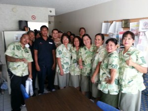 Workers at the Ramada Plaza celebrate their new contract.